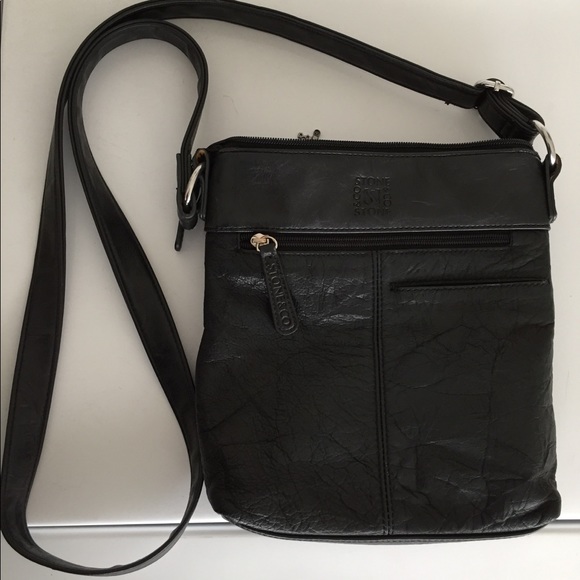 Black cross body purse. Lots of pockets. - Picture 2 of 6